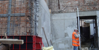 Как выполняется усиление кирпичных стен?